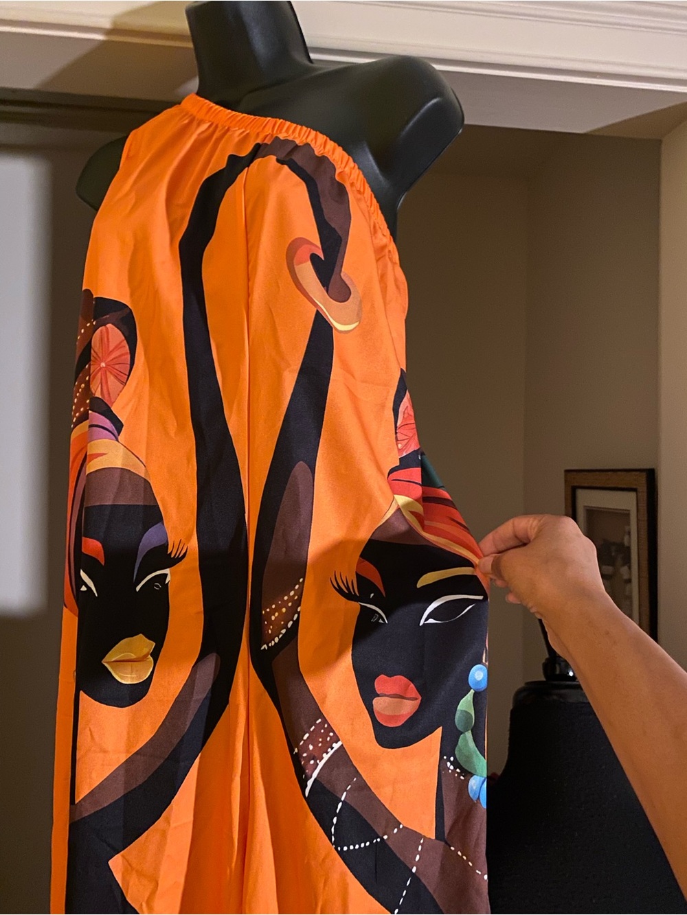 Vibrant Orange Wide-Leg Jumpsuit with Artistic Print